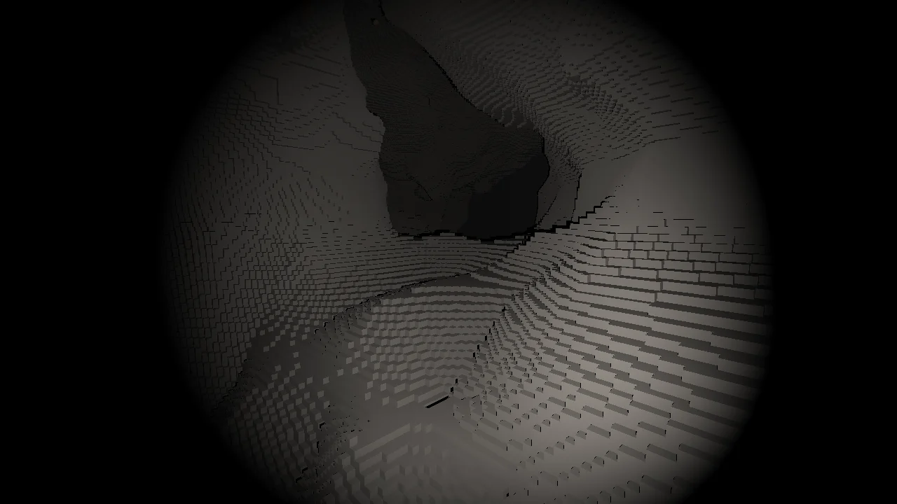 A natural cavern of 10 cm voxels under a headlamp: a stepped floor in the foreground and a dark passage leading away